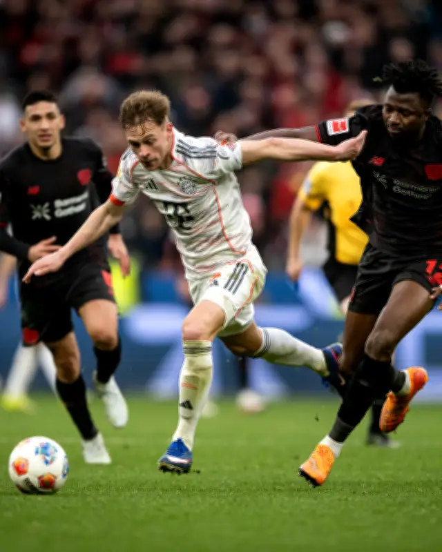 بايرن ميونيخ ينجو من ليفركوزن بتعادل ثمين رغم اللعب بتسعة لاعبين