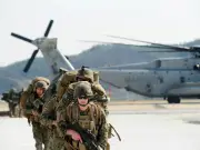 نشر المارينز الأمريكي في مضيق هرمز: هل تتحول المواجهة مع إيران إلى عمليات برية؟