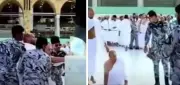 رجال الأمن بالحرم يمكّنون حاجاً من ذوي الهمم من تقبيل الحجر الأسود
