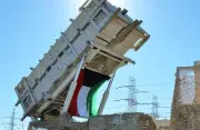 الدفاعات الجوية الكويتية تتصدى لهجمات صاروخية وطائرات مسيرة