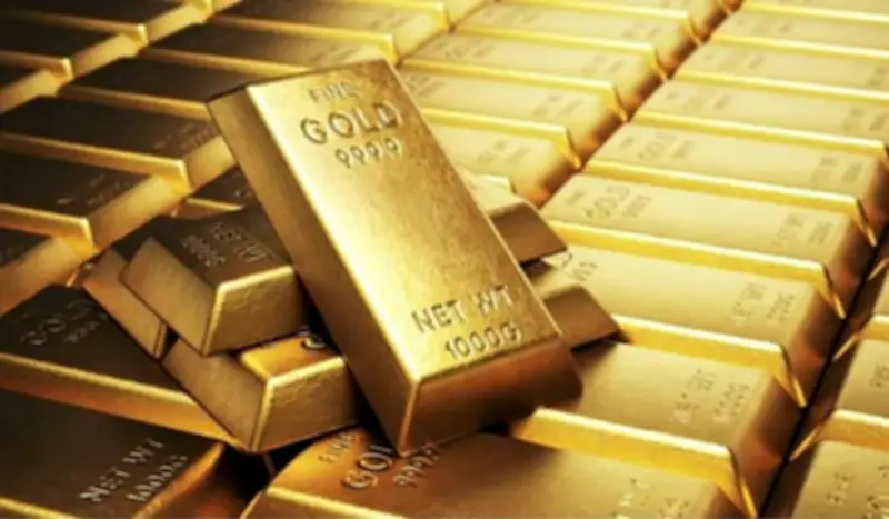 تراجع الذهب مع صعود الدولار وتوقعات رفع الفائدة الأمريكية